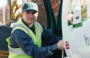 Service tech getting into van